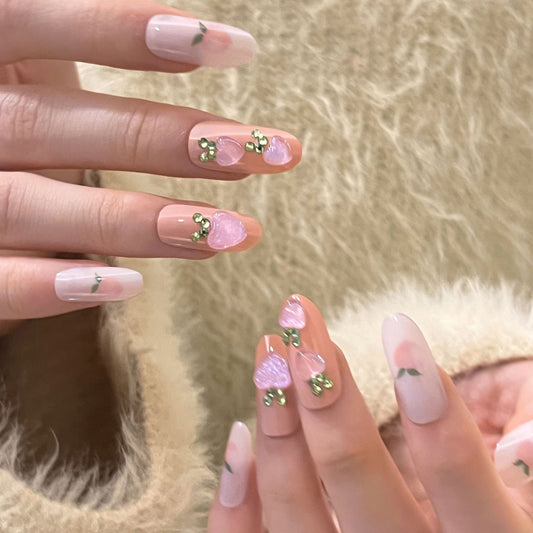 Enchanted Garden Long Oval Translucent Press-On Nails with Green Leaf Accents and Pink Heart Gemstones