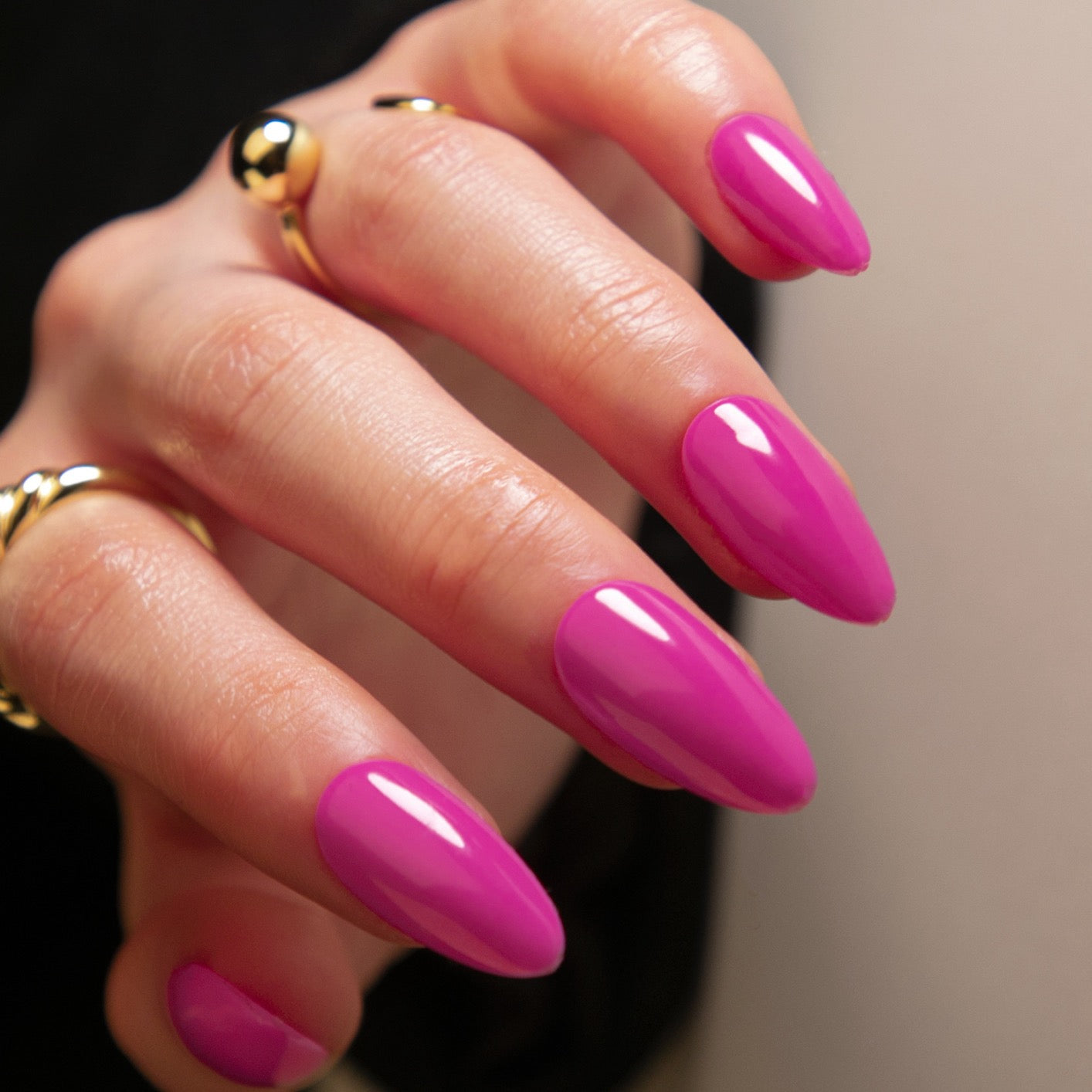 Vibrant Vogue Long Almond Shape Glossy Fuchsia Press On Nail Set with Golden Orb Accent