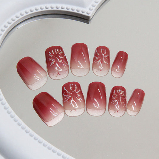 Enchanted Winter Medium Square Press-On Nails in Ombre Red with Sparkling Snowflake Design