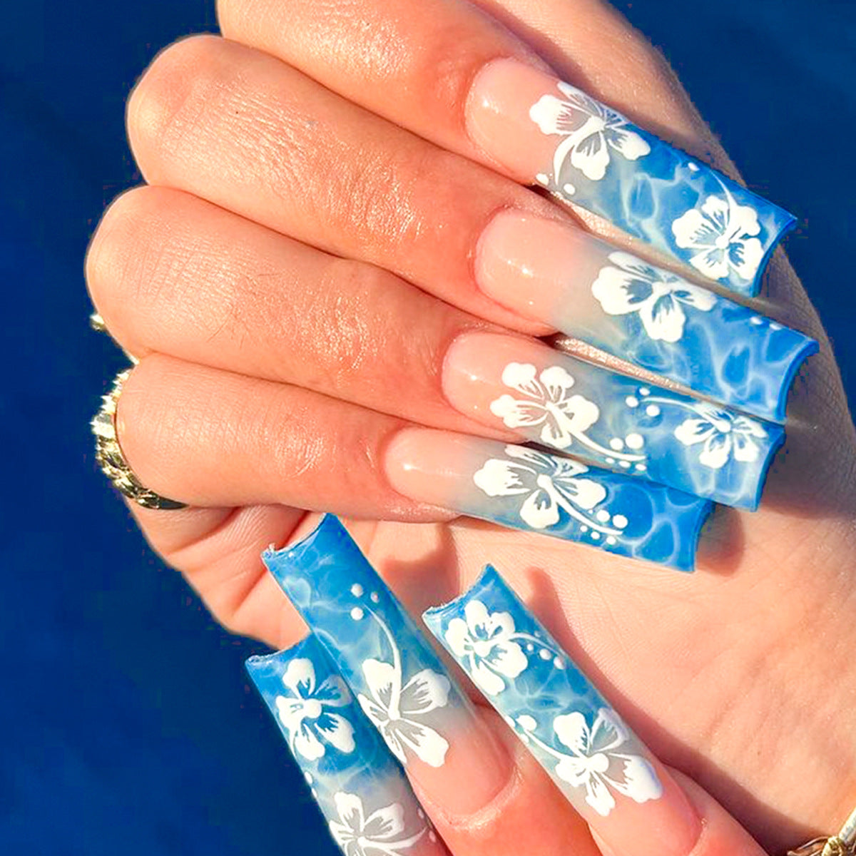 Tropical Escape Long Square Blue Ombre Press On Nails with White Floral Accent