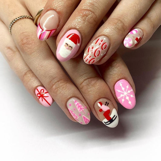 Skiing On Candy Cane Mountain Medium Oval Pink Holiday Press On Nails