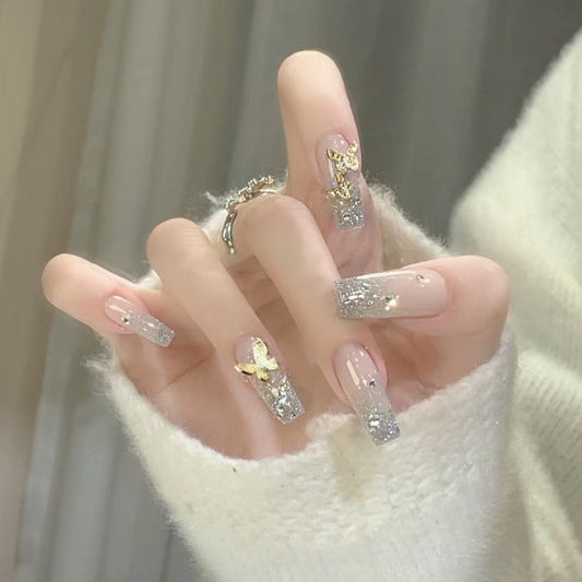 Enchanted Winter Long Coffin Press-On Nail Set in Soft Pink with Gold Flakes and Sparkling Accents