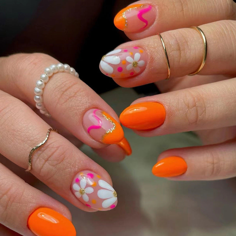 The Next Hearing Medium Oval Orange Floral Press On Nails