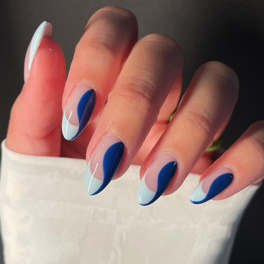 Sleek Sapphire Medium Almond White and Blue Press-On Nail Set with Dynamic Swirl Design