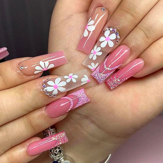 Spring Blossom Medium Length Square Press-On Nails with Pink Base, Glitter Accents, and White Floral Art