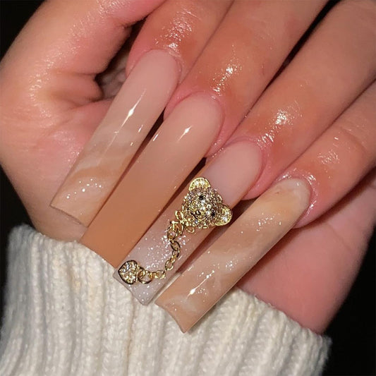 Sophisticated Glamour Long Square Neutral Press-On Nails with Luxe Gold Glitter and Chain Detail