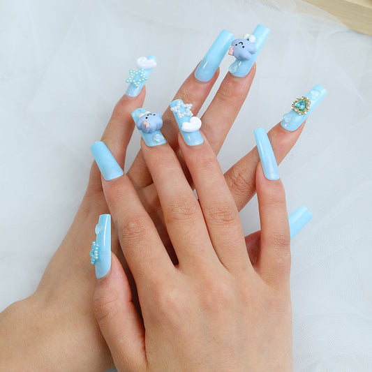 Whimsical Winter Long Coffin Sky Blue Press On Nails with Cloud and Snowflake Charms