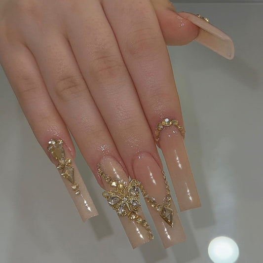 Regal Extravagance Long Square Press-On Nails with Beige Base, Gold Accents, and Rhinestone Embellishments