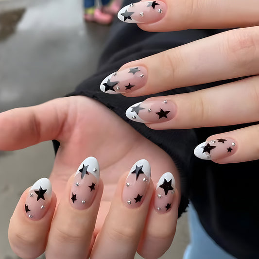 Starry Night Medium Oval Milky White Press On Nails with Black Stars and Crystal Embellishments