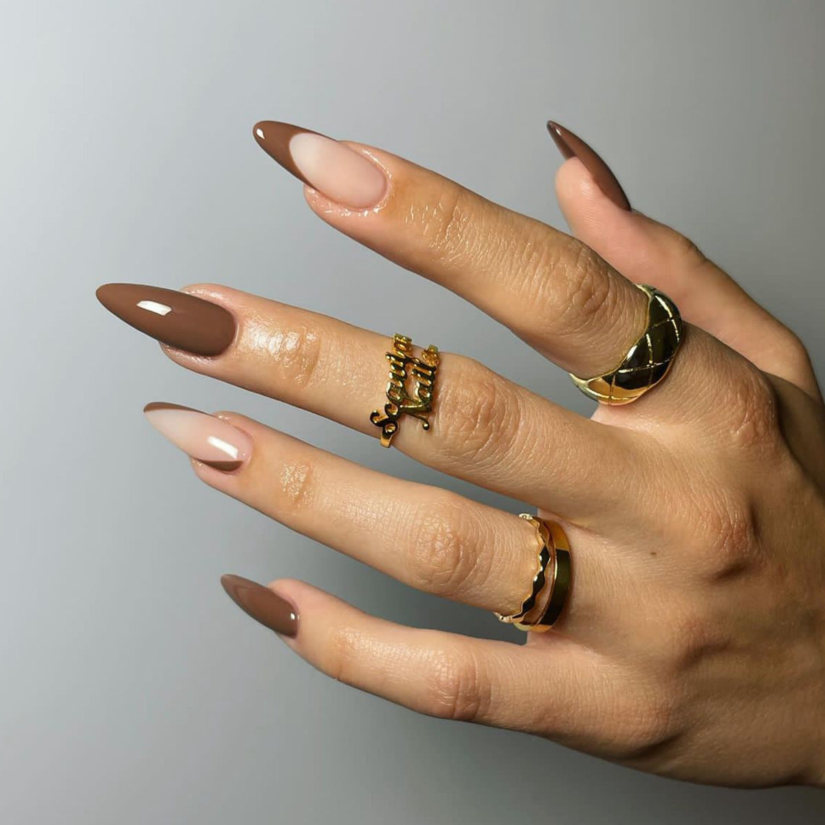 Sophisticated Mocha Long Almond Taupe Press On Nails with Glossy Finish and Beige Accents