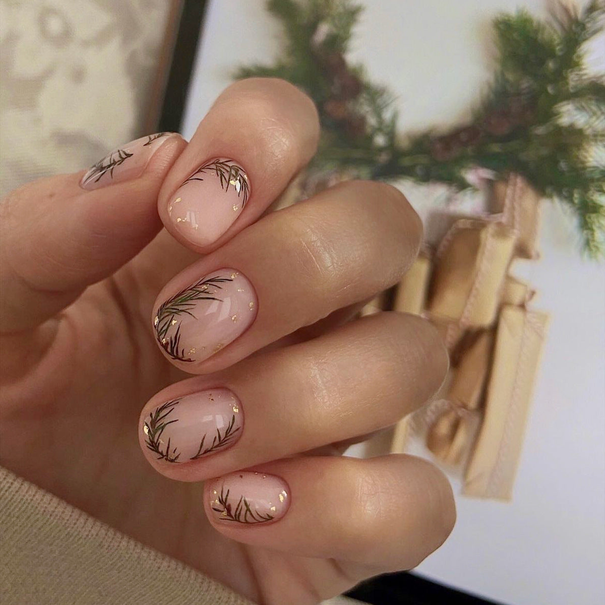 Winter Pine Short Round Beige Press On Nails with Delicate Pine Branch Art and Gold Flecks