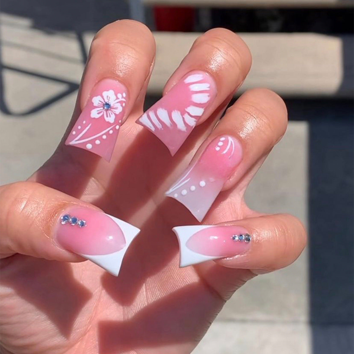 Tropical Escape Medium Duck Pink Press On Nails with White Floral Art and Rhinestone Embellishments