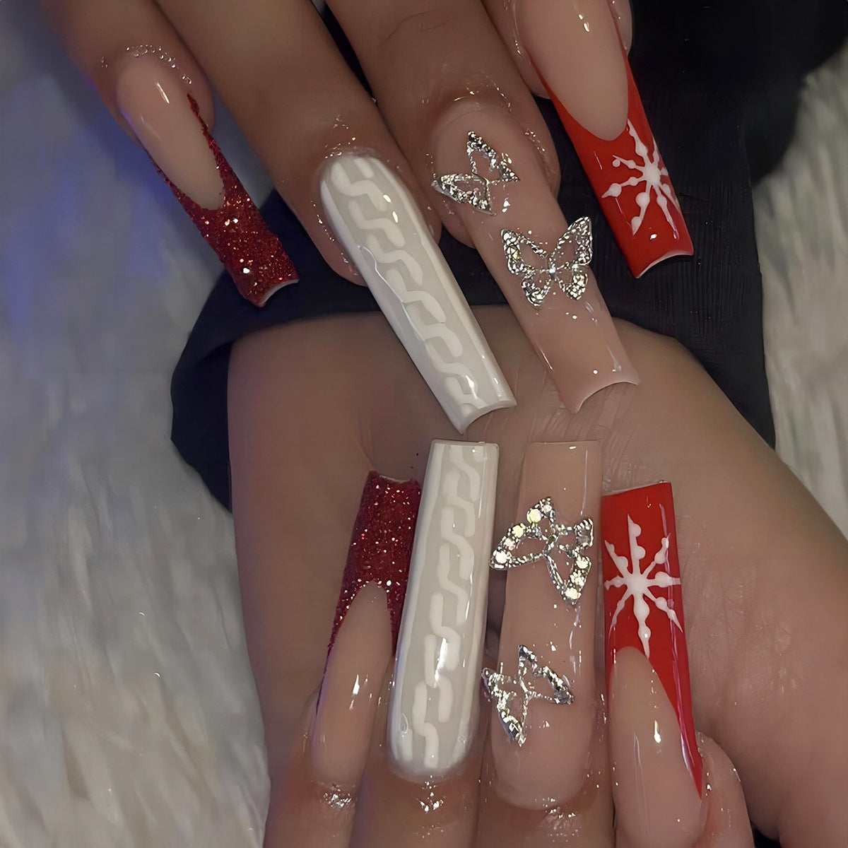 Festive Finesse Long Coffin Beige and Red Press On Nail Set with Glitter, Snowflake Design, and Butterfly Charms