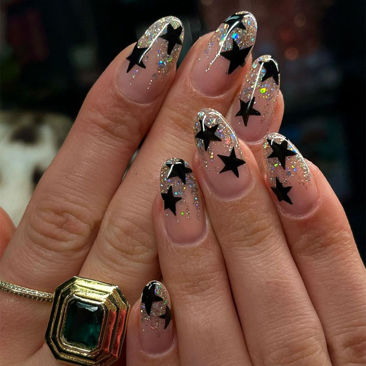 Starry Night Medium Almond Clear Press-On Nails with Black Stars and Glitter Overlay