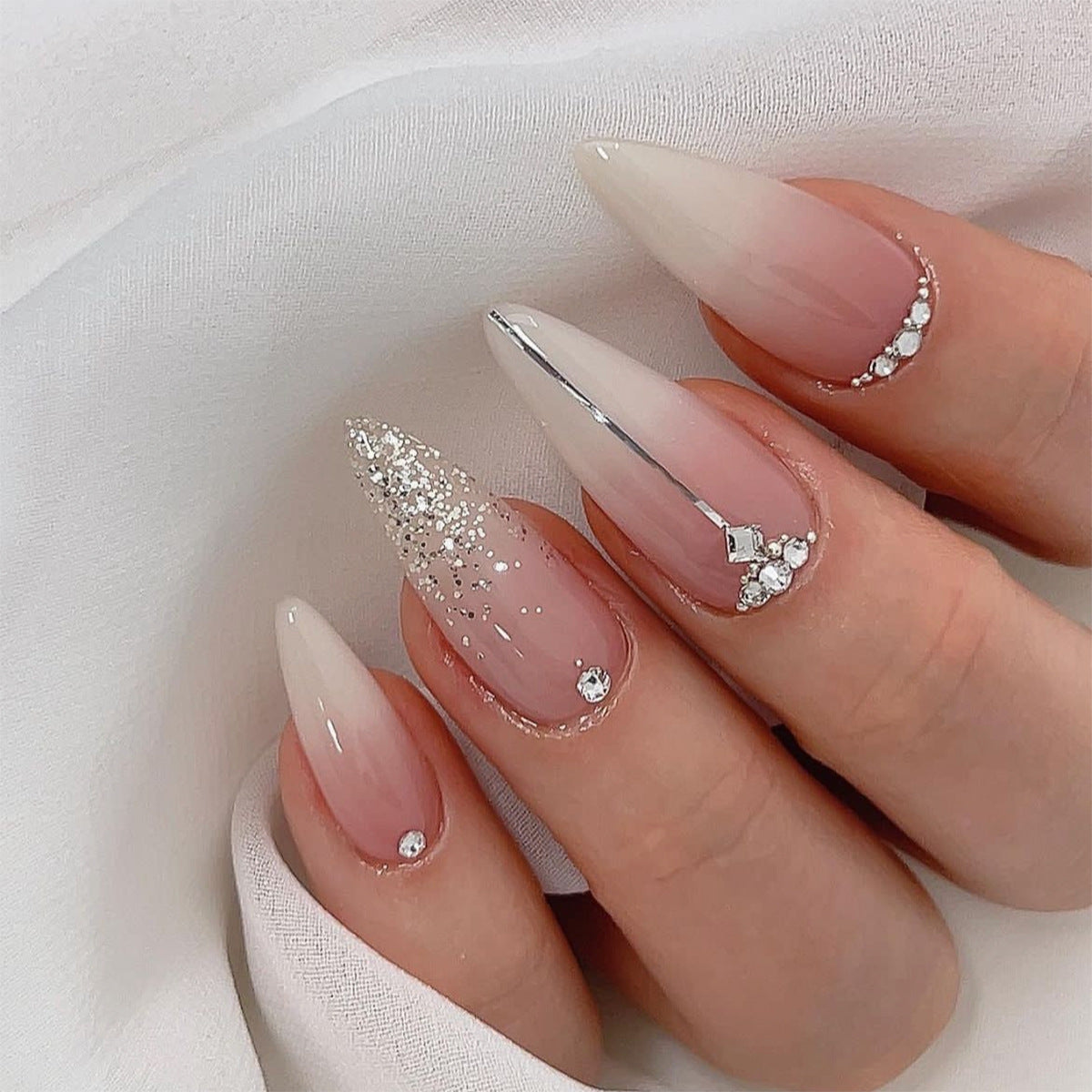 Long Almond Beige Press On Nails with Silver Glitter Accents and Rhinestone Embellishments