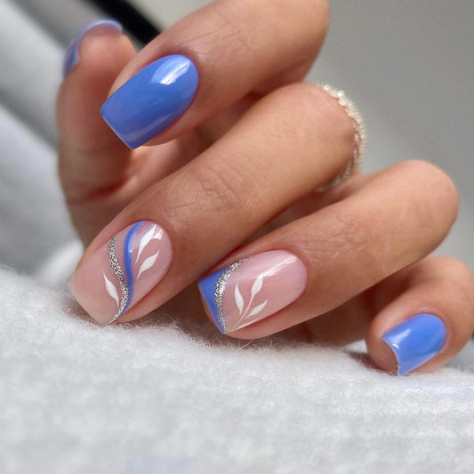 Serene Skies Medium Square Periwinkle Blue Press On Nails with Sheer Pink Leaf Design and Silver Glitter Accents