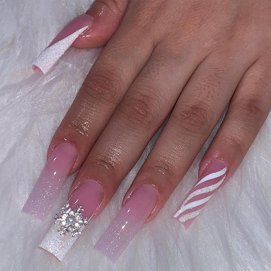 Winter Wonderland Extra-Long Coffin Pink Glitter Press-On Nail Set with Snowflake Charm and White Stripe Accents