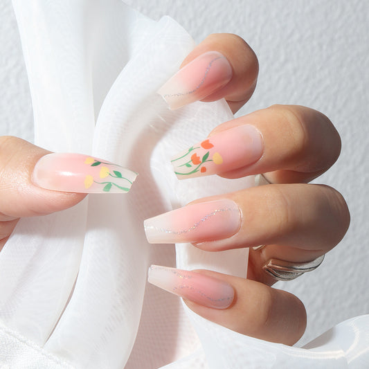 Spring Blossom Long Coffin Peach Press On Nail Set with Floral Accents and Rhinestone Embellishments