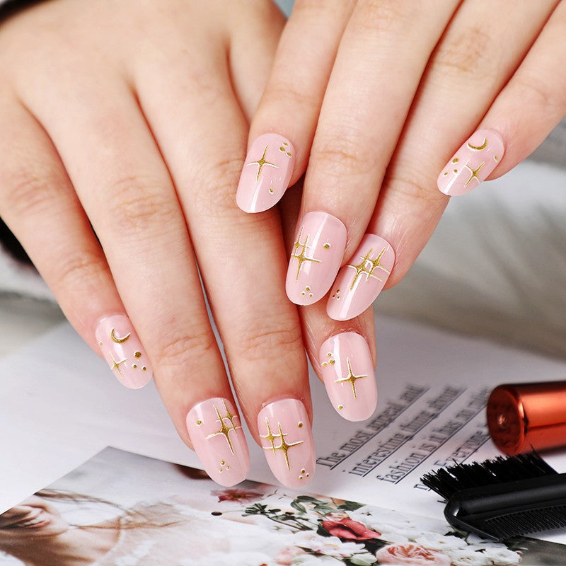 Elegant Celestial Charm Medium Oval Pink Press On Nails with Gold Accents