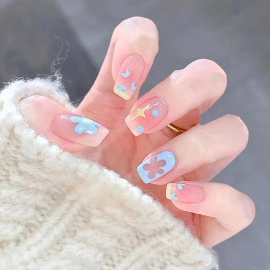 Whimsical Cloudscape Medium Square Pale Pink Press On Nail Set with Blue Sky Accents and Adorable Raindrop Details