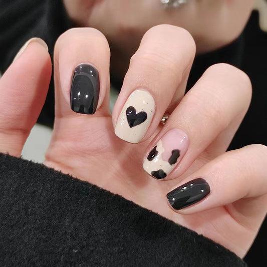 Chic Romance Short-Length Squoval-Shaped Press On Nail Set in Classic Black and Beige with Heart Accents