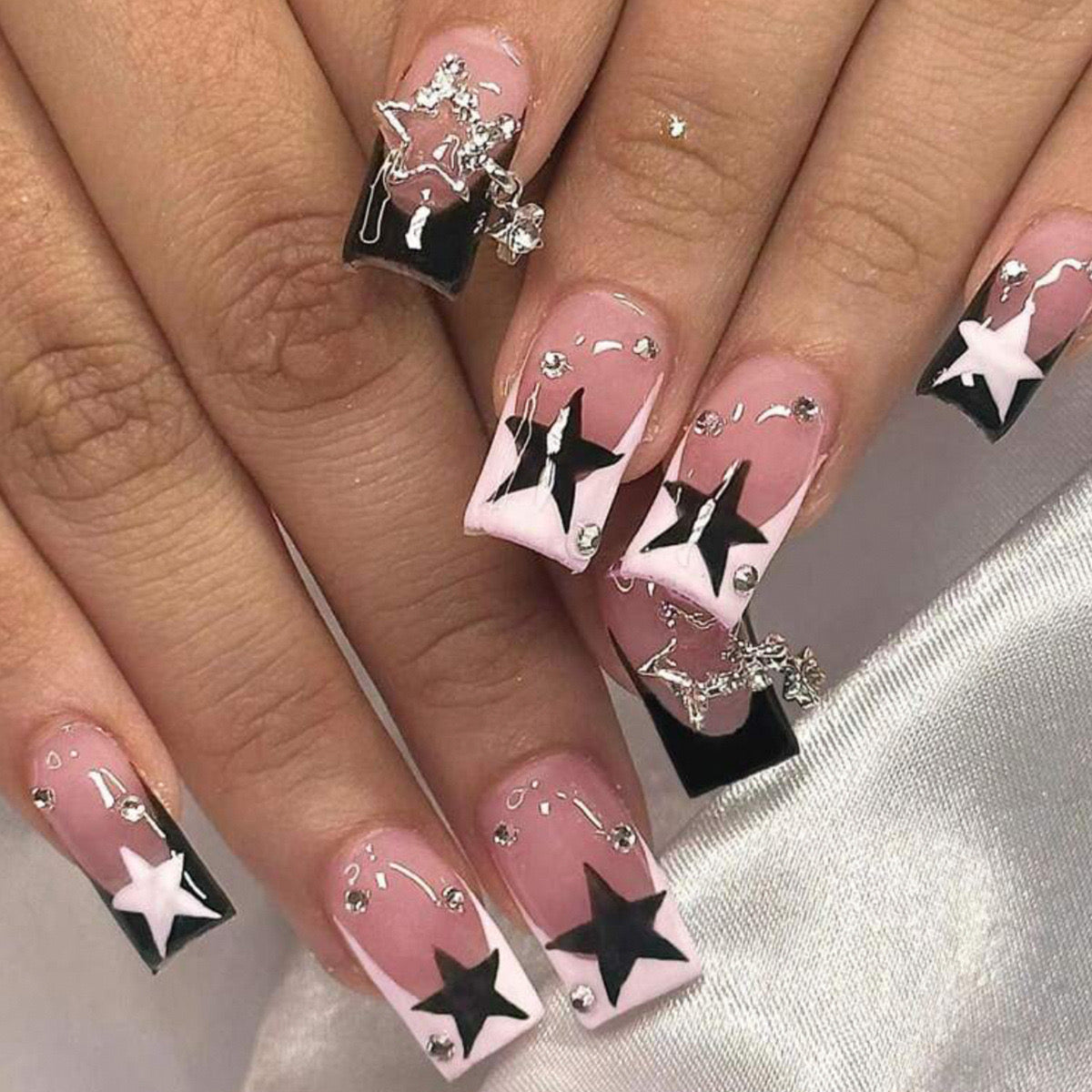 Starry Elegance Medium Square Pink Press On Nail Set with Black Stars and Gem Accents