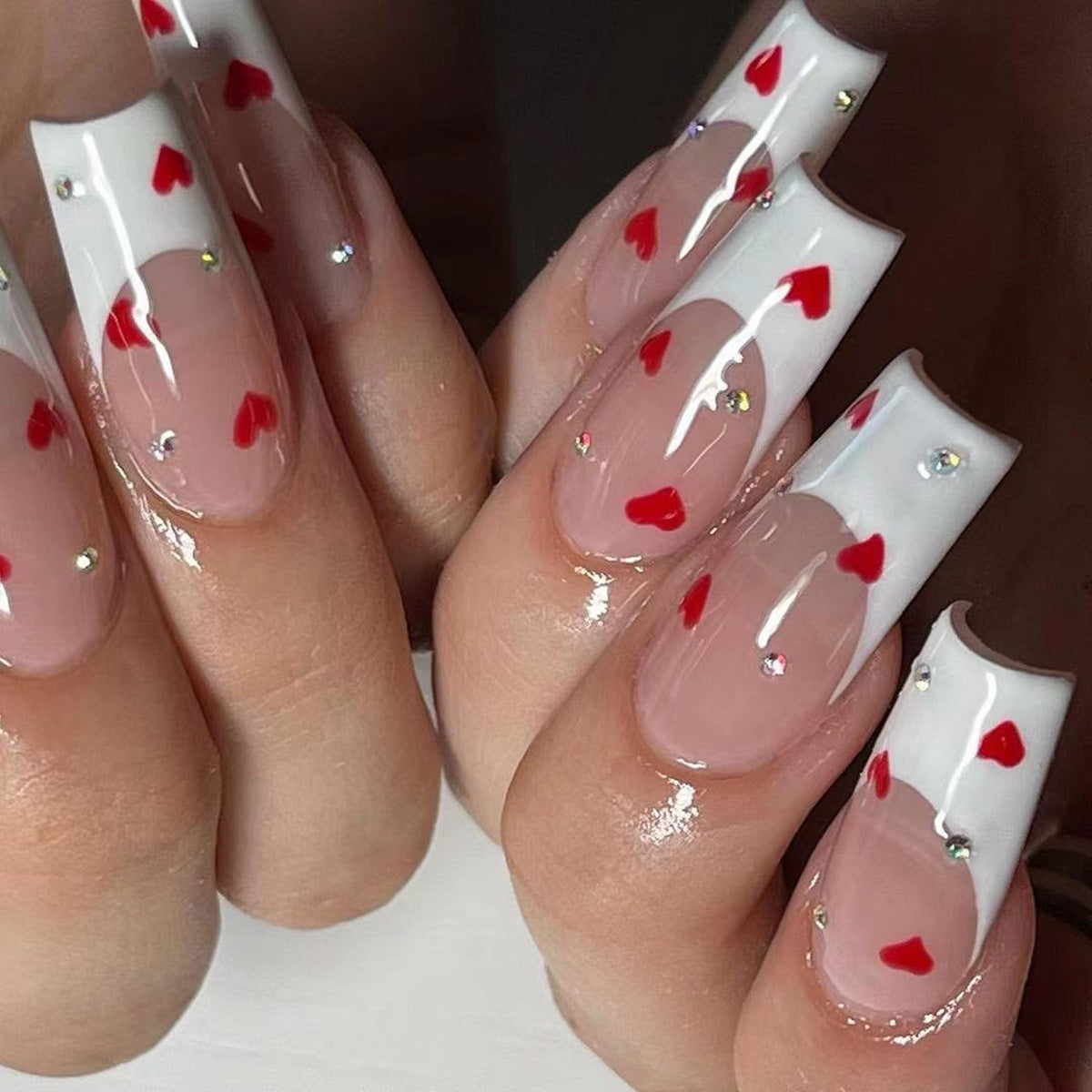 Romantic Hearts Theme Long Coffin Clear White Press On Nail Set with Red Accents and Rhinestone Embellishments