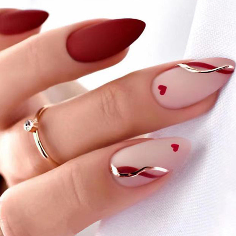 Romantic Elegance Medium Almond Burgundy Press On Nail Set with Heart Accents and Metallic Twist