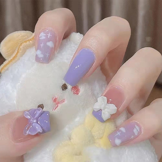 Lavender Dreams Medium Coffin Press on Nail Set in Soft Purple with Cloud Patterns and 3D Flower Appliques