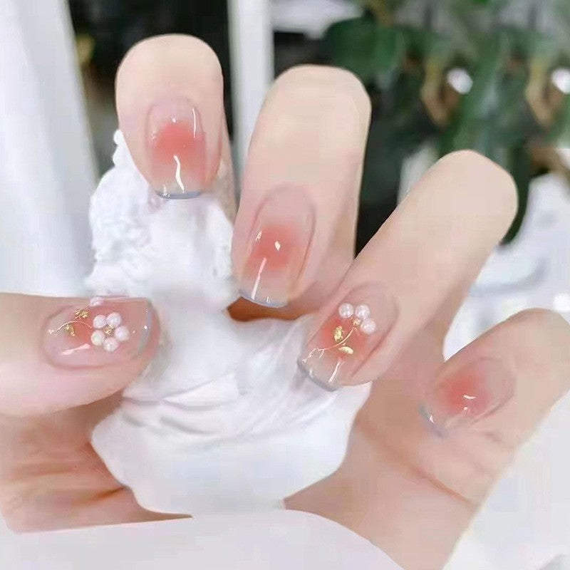 Garden Party Medium Squoval Beige Press On Nails with Clear Tips, Floral Accents, and Gold Flakes