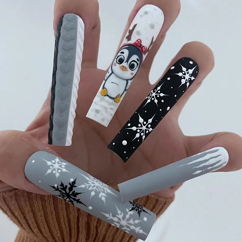 Winter Whimsy Long Coffin Press On Nails in Monochrome Shades with Playful Penguin Art and Snowflake Accents