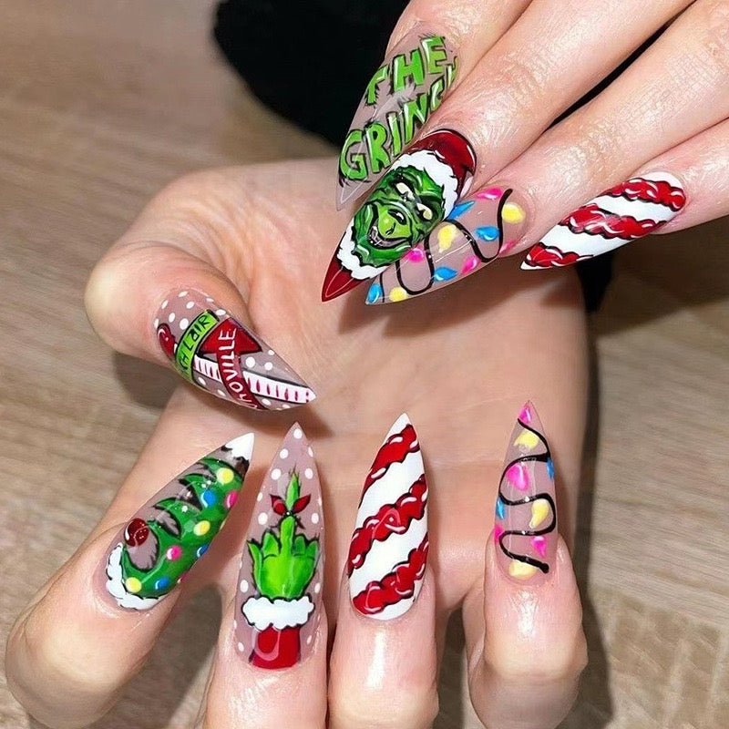 Festive Follies Extra Long Almond Shaped Press On Nail Set with Multicolor Christmas Patterns and Character Embellishments