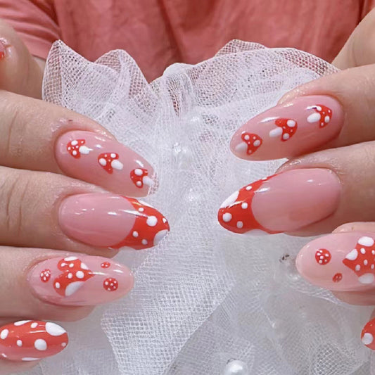 Enchanted Mushroom Garden Medium Almond-Shaped Red and White Press-On Nail Set with Polka Dots and Floral Accents