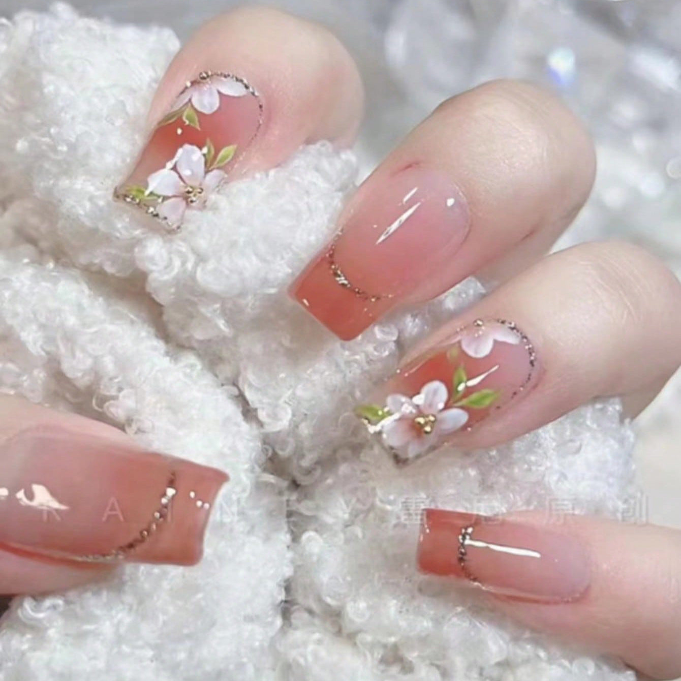 Spring Blossom Medium Square Peach Press On Nail Set with Floral Embellishments and Rhinestone Accents